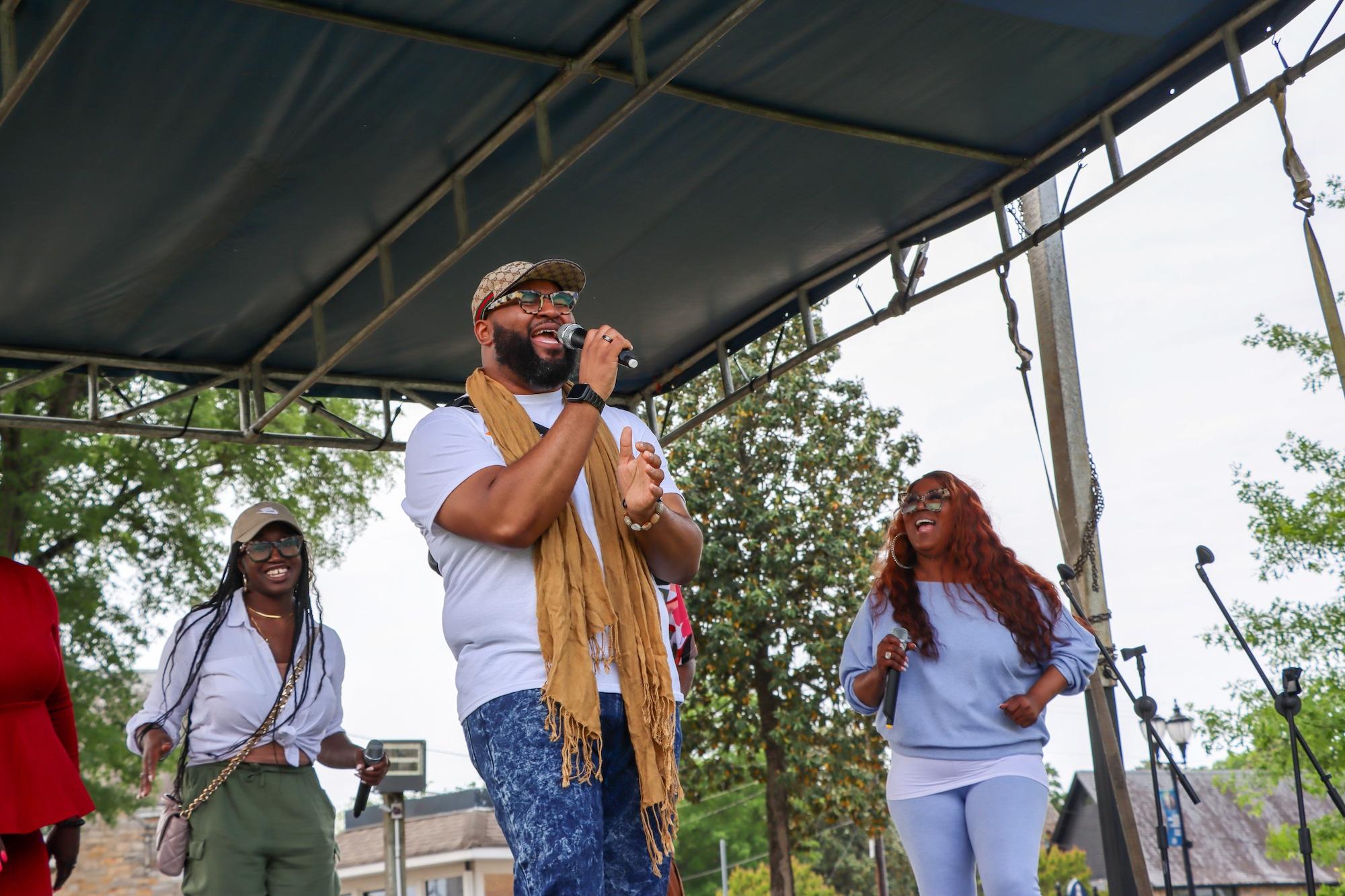 Singers from RIMA on stage performing