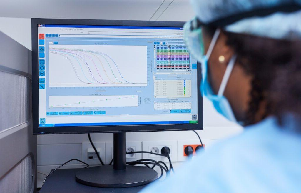 Researcher analyzing data on the computer in the laboratory at Covid-19 vaccine research, biological and physical, bachelor of science biology, biology degree sciences